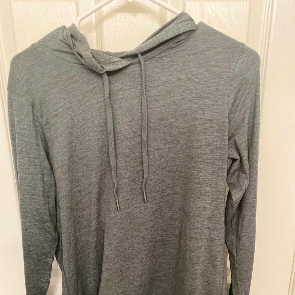 A grey pull over hoodie
